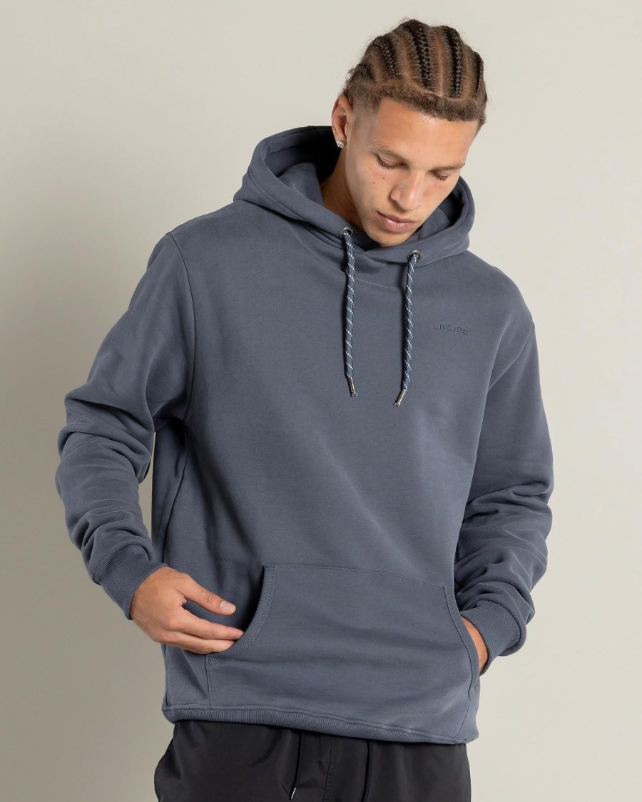 Man wearing a grey hoodie